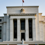Federal Reserve Cautious Amidst Downgrade and Market Volatility