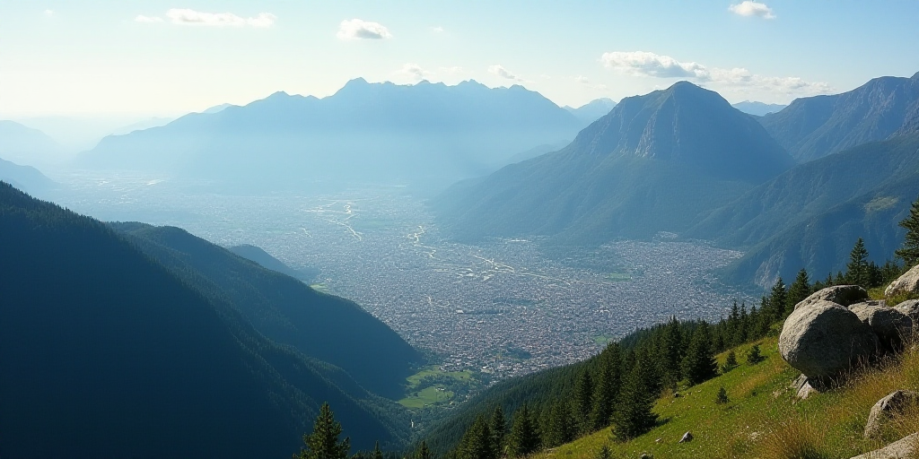 a view of a city from a high point of view of a mountain range with a city below it, Altichiero, mou