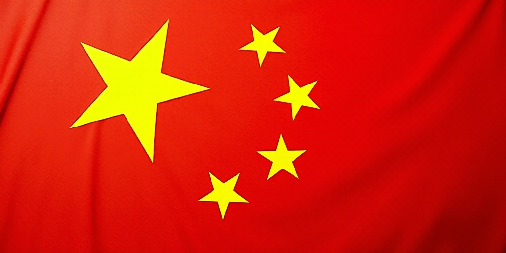 a close up of a flag with a red background and a yellow one with white stars on it and a red one wit