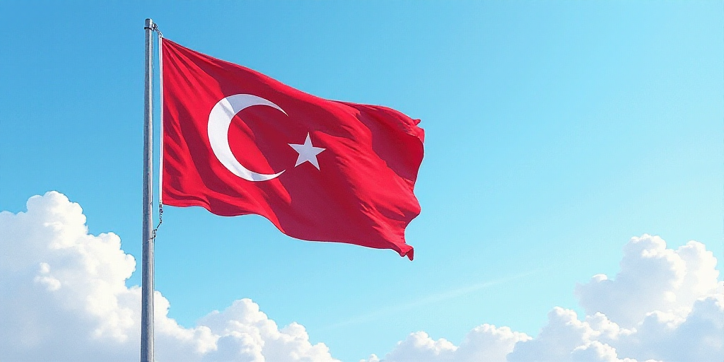 a flag flying in the wind with a blue sky in the background and a cloudless sky in the background, C