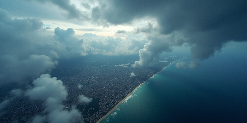 a satellite image of a cloud over the ocean and land area of a city and a city on the other side of