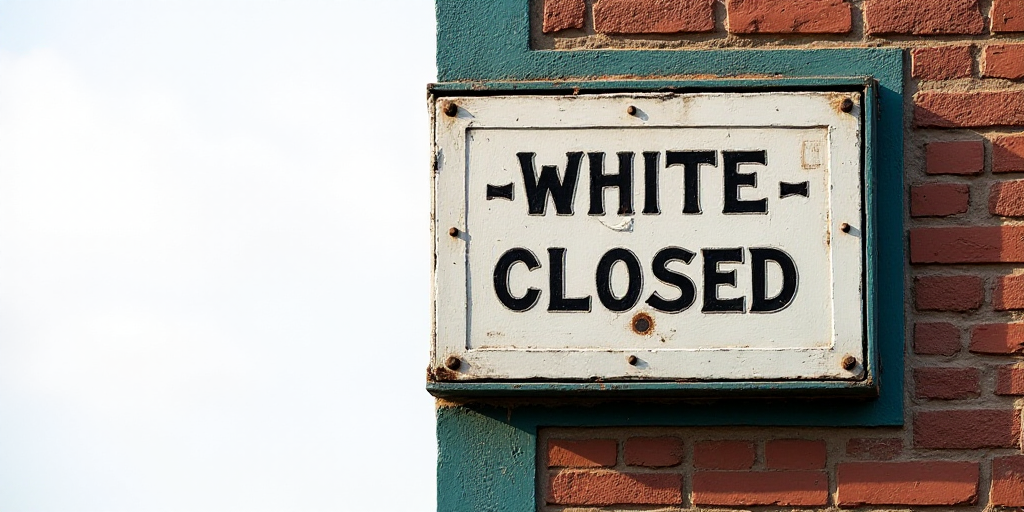 a sign that is on the side of a building that says the white house is closed down on the front, Éva
