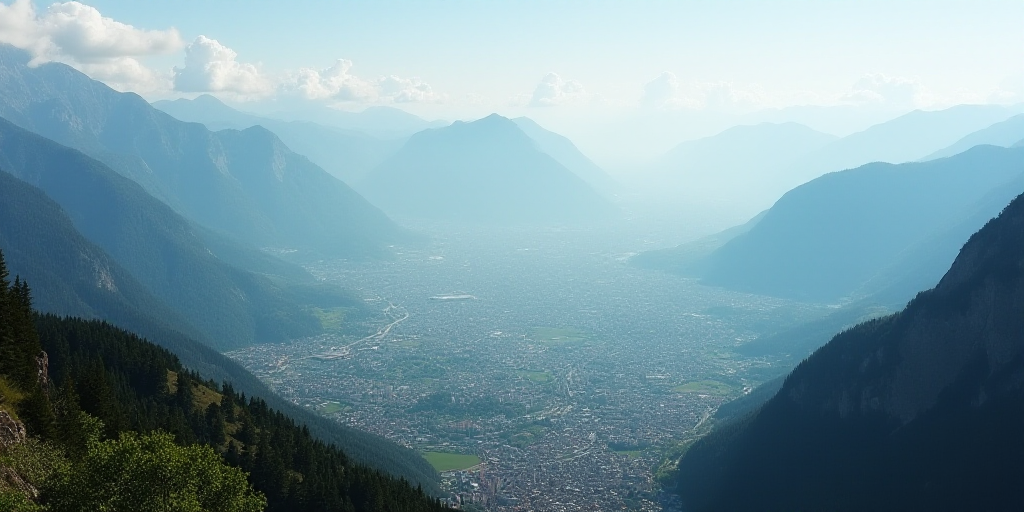 a view of a city from a high point of view of a mountain range with a city below it, Altichiero, mou