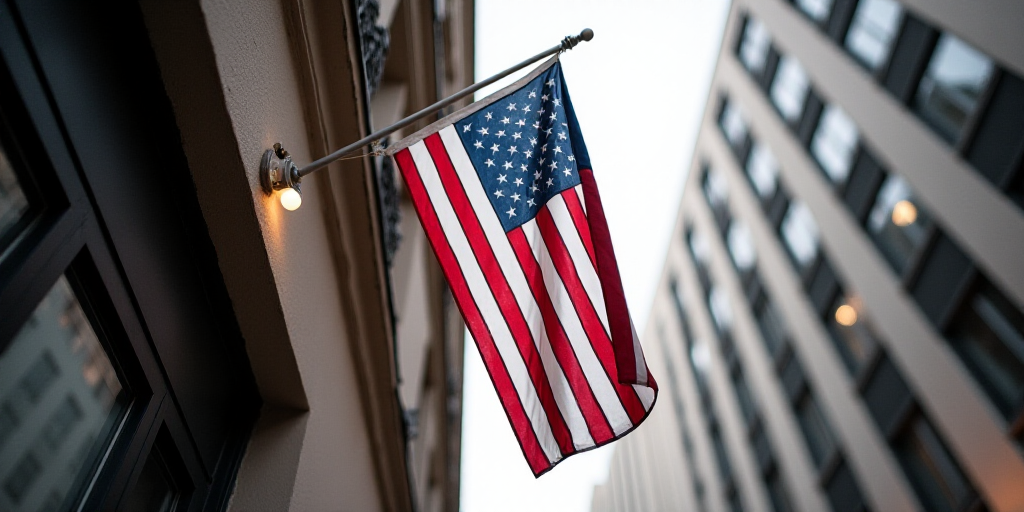 a flag hanging from a building with a window in the background and a building facade with a large wi