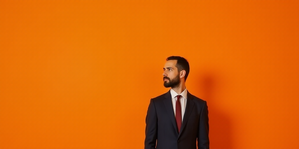 a man in a suit standing in front of an orange background with the words remesas entre mexico y arge