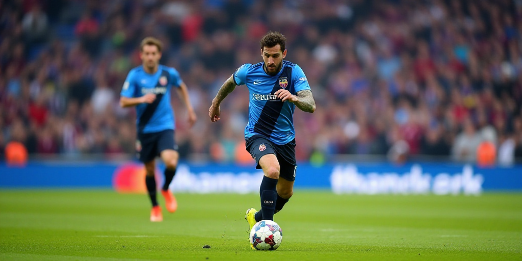 a soccer player kicking a soccer ball on a field with a crowd watching from the stands behind him an