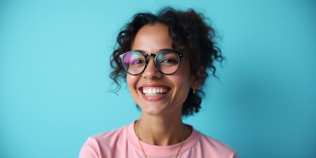 a woman in glasses is smiling for the camera with a blue background and a black and white photo of h
