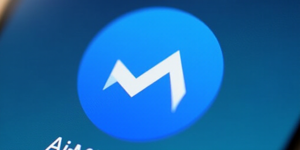 a close up of a blue and white logo on a cell phone with a blue background and a blue circle, Ai-Mit