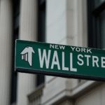 Wall Street Ends Higher Following Powell’s Hint at Interest Rate Cut