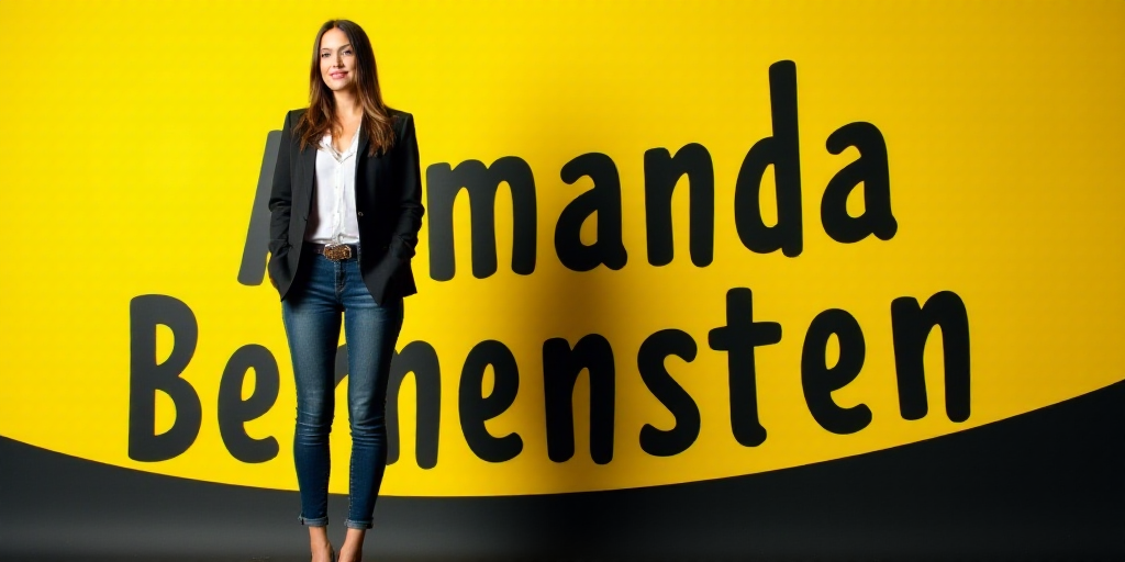 a woman in a suit and jeans standing in front of a yellow and black background with the words amanda