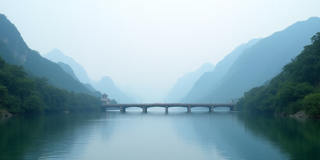 a large body of water with a bridge in the background and a mountain in the background with trees on
