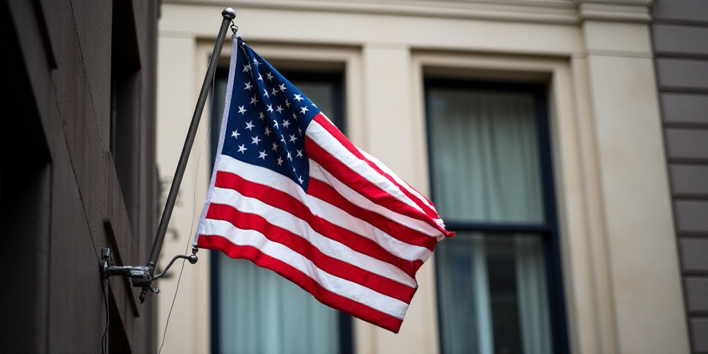 a flag hanging from a building with a window in the background and a building facade with a large wi
